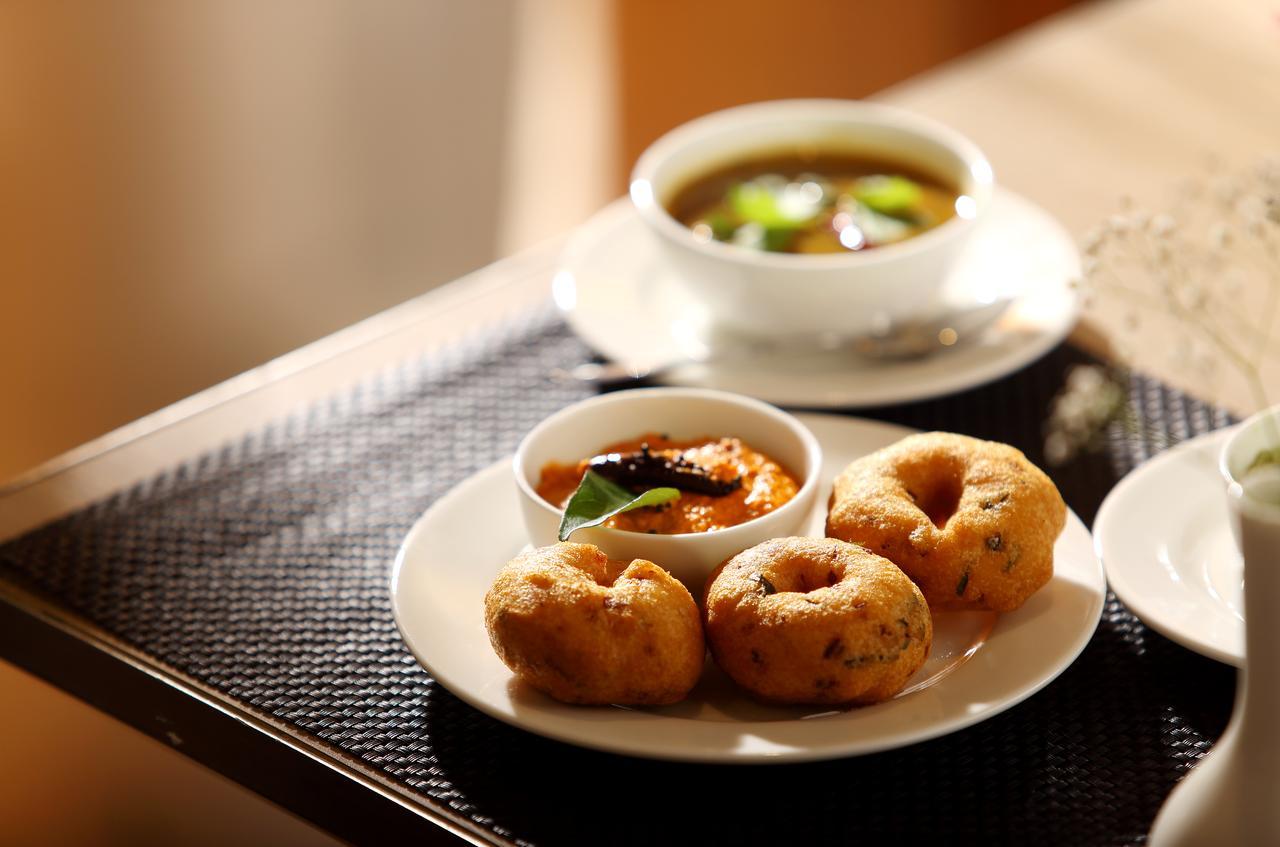 Sugar Business Hotel Kochi Buitenkant foto