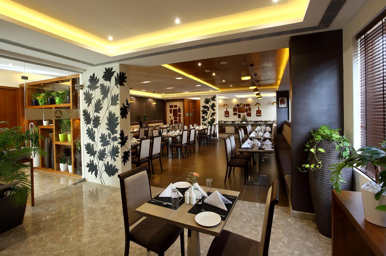 Sugar Business Hotel Kochi Buitenkant foto