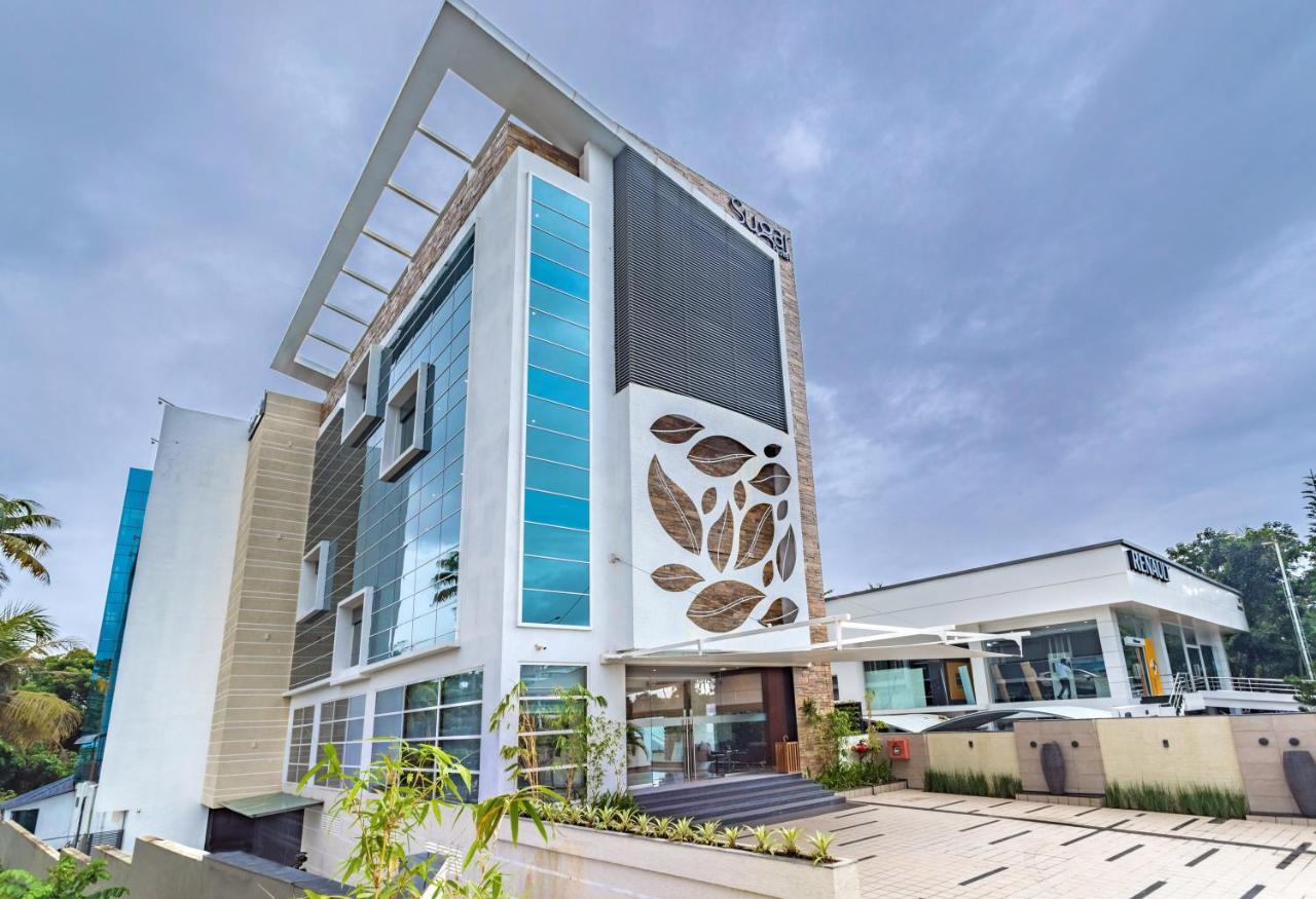 Sugar Business Hotel Kochi Buitenkant foto