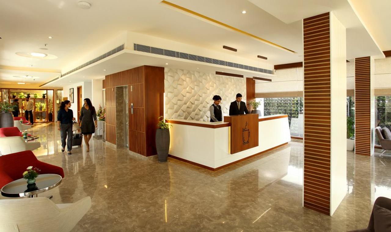 Sugar Business Hotel Kochi Buitenkant foto